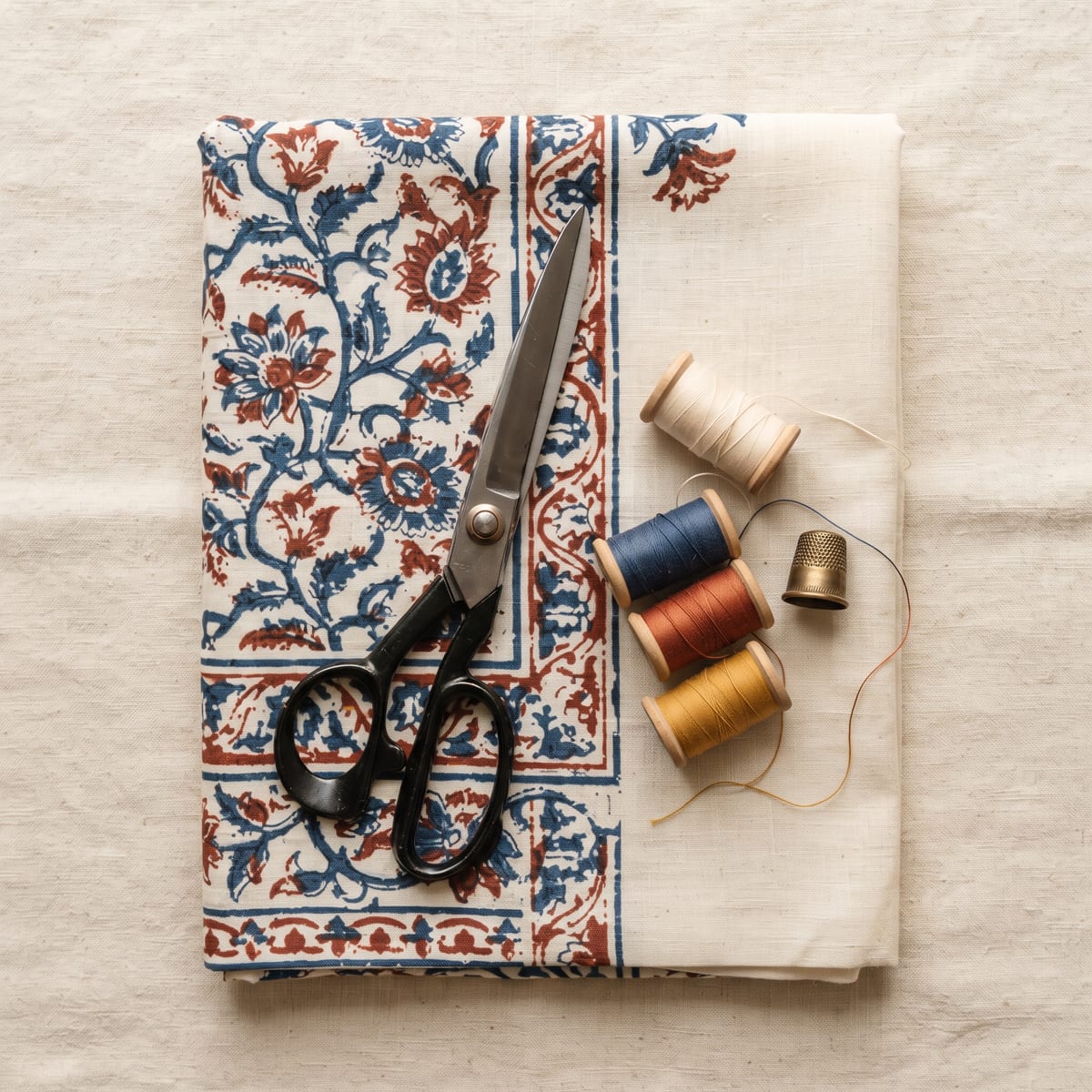 Tailor's scissors on printed cotton